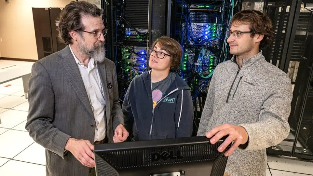 Professor Scott Beckman (left) with postdoctoral researcher Jordan Barr and former student Luke Ross (ME, '24).