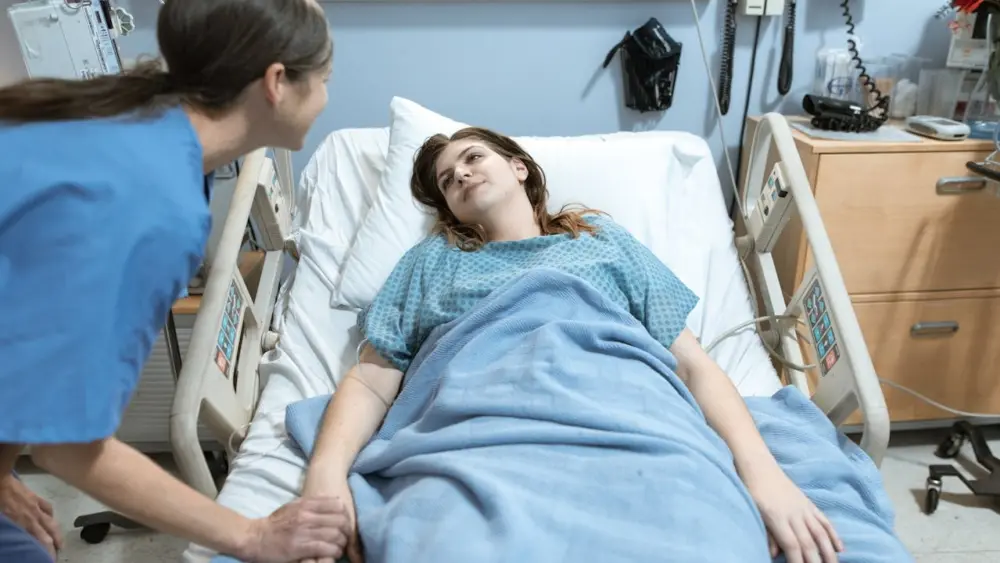 Photo by RDNE Stock project: https://www.pexels.com/photo/a-woman-talking-to-a-patient-6129689/