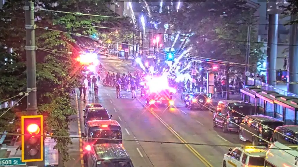 The explosion following a protestor threw a large firework a Seattle Police. Photo: Seattle Police Department