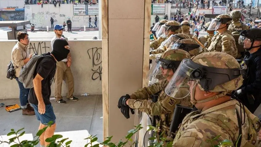 Soldiers from 1st Battalion, 185th Infantry Regiment, 79th Infantry Brigade Combat Team, a California Army National Guard unit in a Title 10 status, protect federal personnel and property in Los Angeles on June 9, 2025. Capt. Alexander Werden, U.S. Army photo | DVIDS