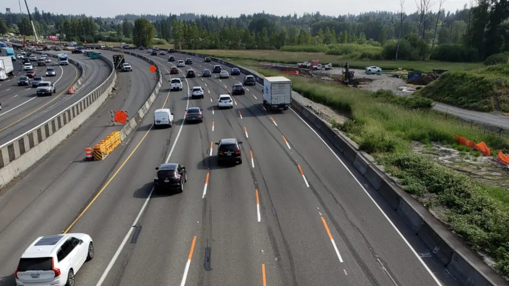 Vehicles travel through a construction zone near Fife, on Interstate 5 in June 2023. (Washington State Department of Transportation)