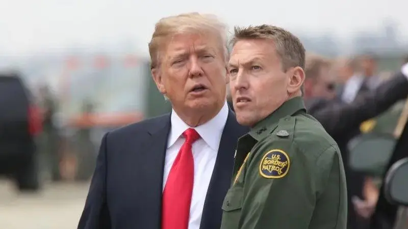 President Trump discusses borders security with then San Diego Border Patrol Sector Chief Patrol Agent Rodney Scott during a visit to the border wall prototypes and mockups. Photo Credit: Border Patrol Agent Tim Tucciarone