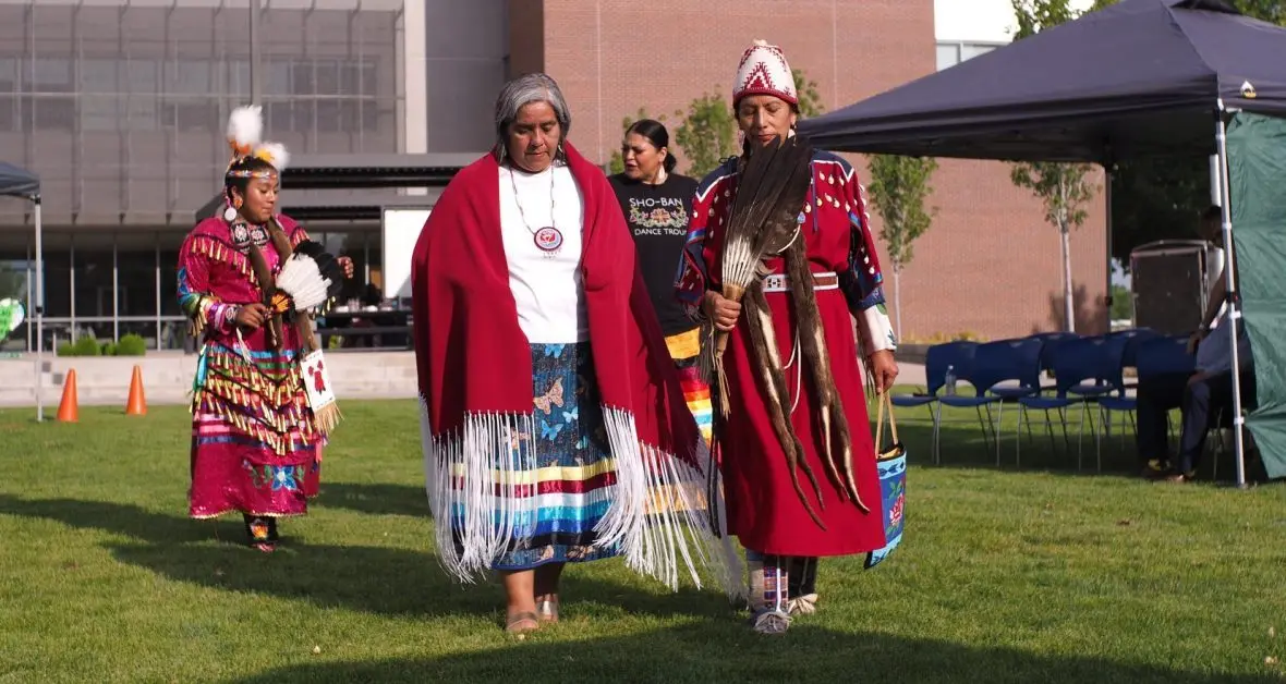 Joyce McFarland, center, walks in the dancing circle during a “mini powwow” on Thursday. (Kaeden Lincoln/IdahoEdNews)