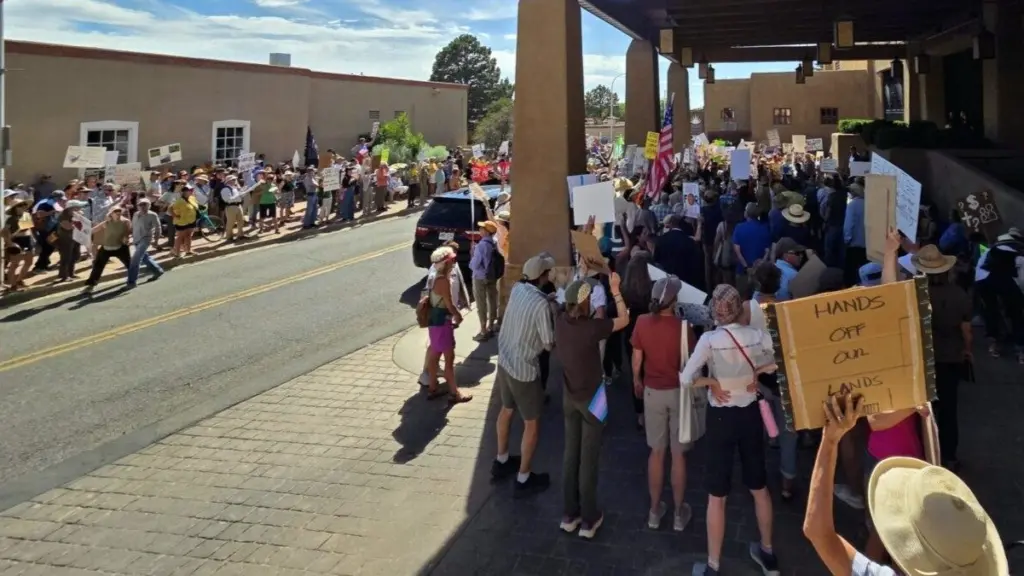 Hundreds of protesters marched to El Dorado Hotel in downtown Santa Fe, where the Western Governors Association was holding its annual meeting on June 23, 2025. (Photo by Austin Fisher/Source NM)