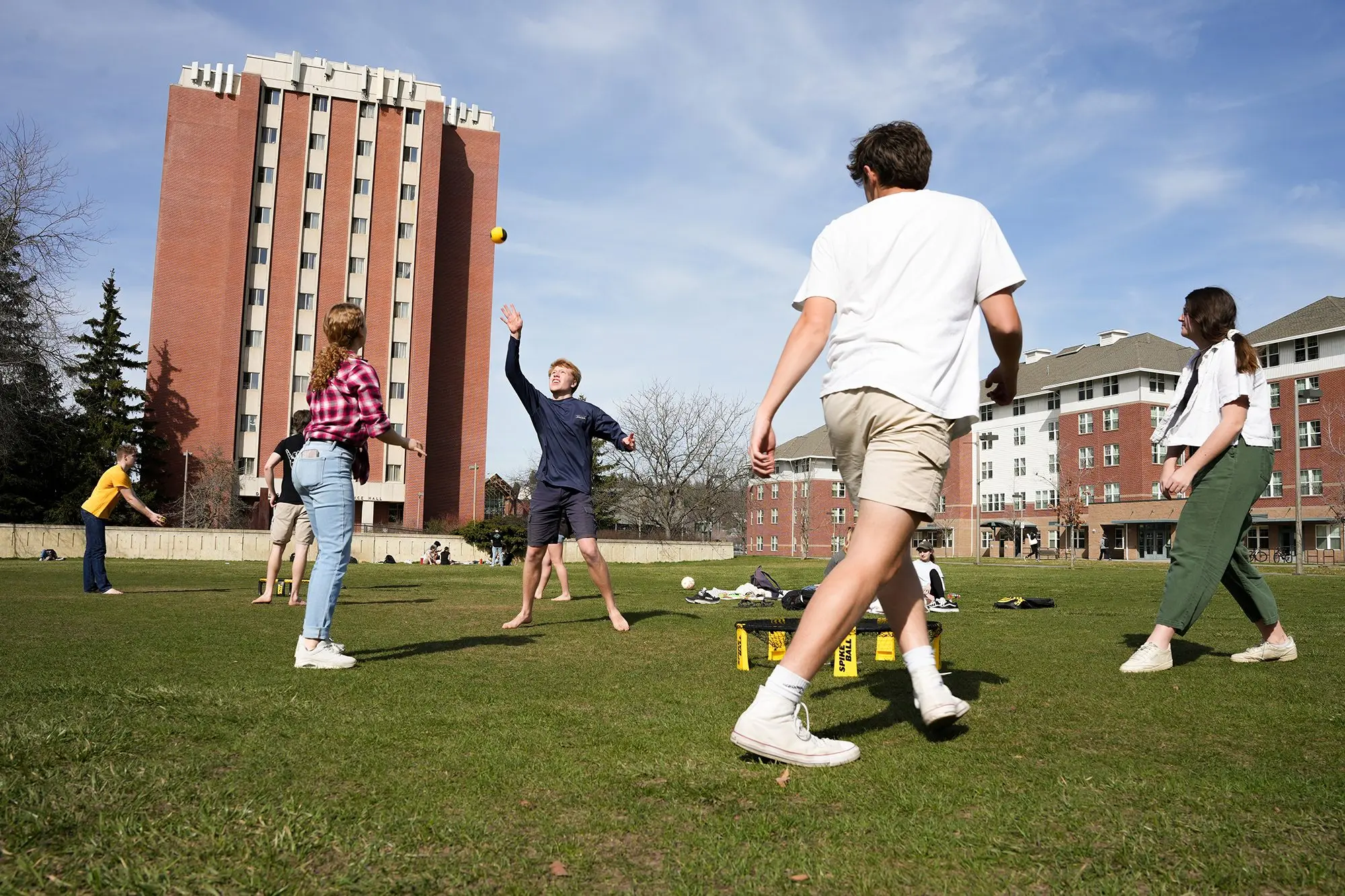 U of I students play games on the Theophilus Tower Lawn.