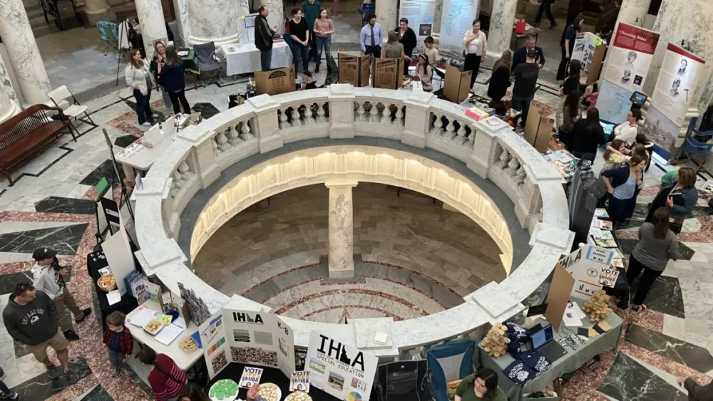 Idaho virtual school parents and students gather at the Statehouse in March, to lobby against a bill that would have restricted online schools. (Ryan Suppe/Idaho EdNews)