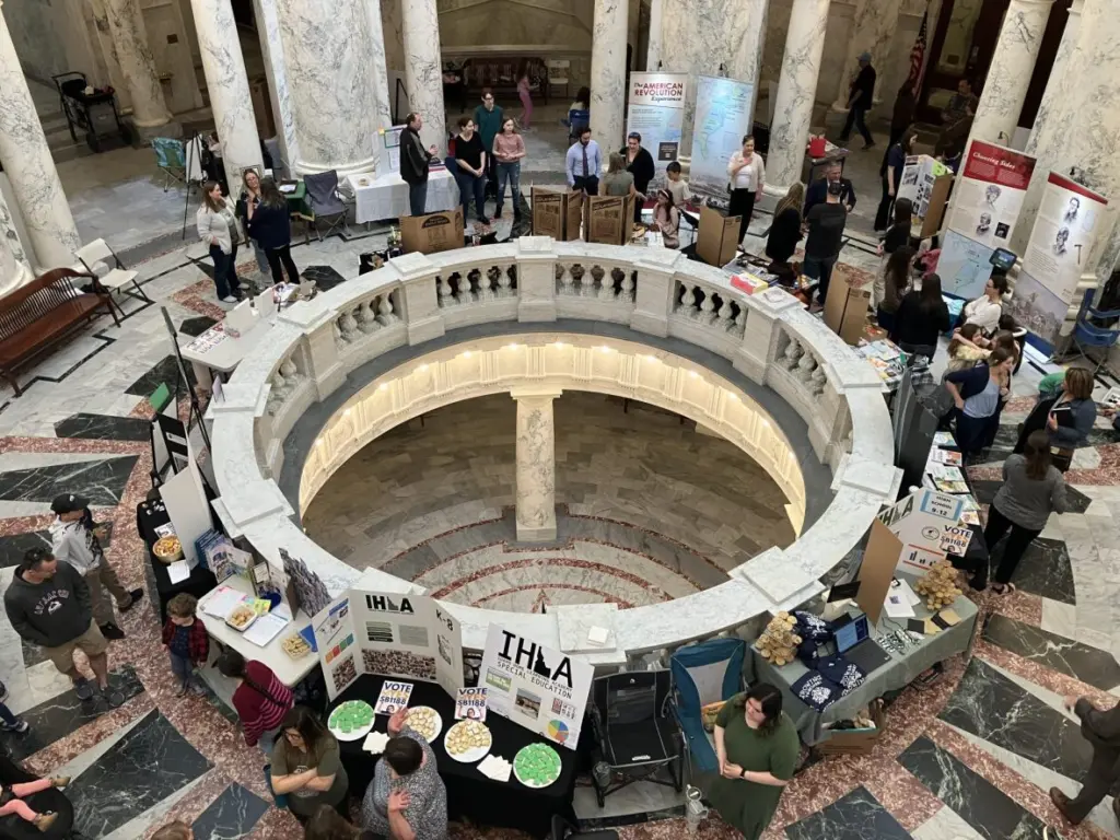 Idaho virtual school parents and students gather at the Statehouse in March, to lobby against a bill that would have restricted online schools. (Ryan Suppe/Idaho EdNews)