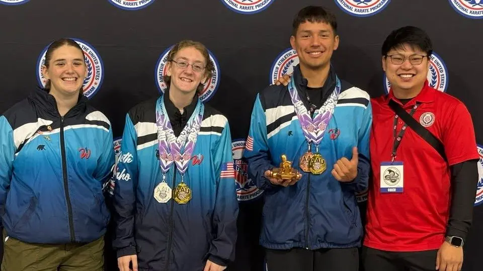 Left to right: Makaela Everheart, CC Subis, Anton Arthur, and Coach Jonathan Morrow.