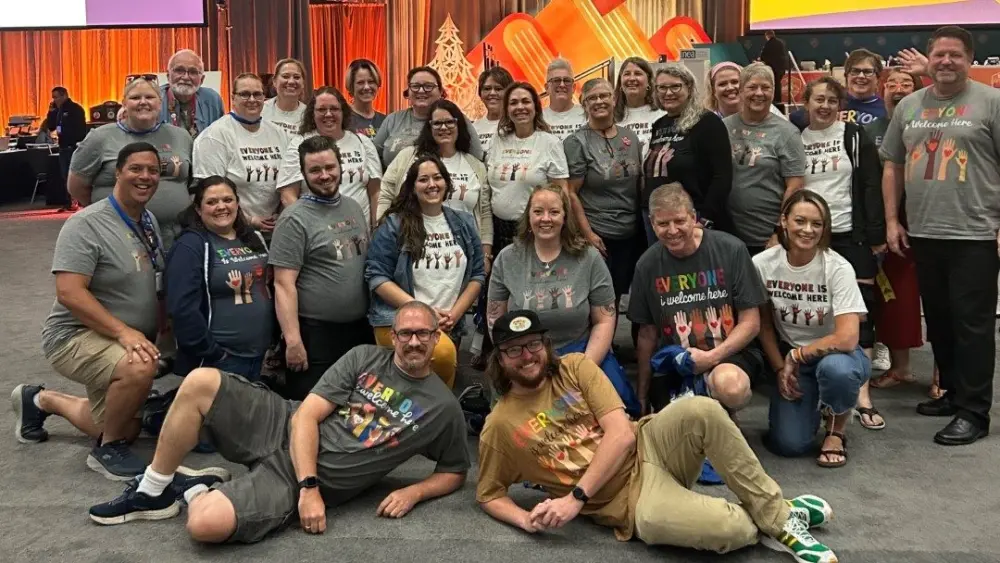 Idaho Education Association members pose, along with others, wearing “Everyone is Welcome Here” shirts during a national conference. (Courtesy IEA)