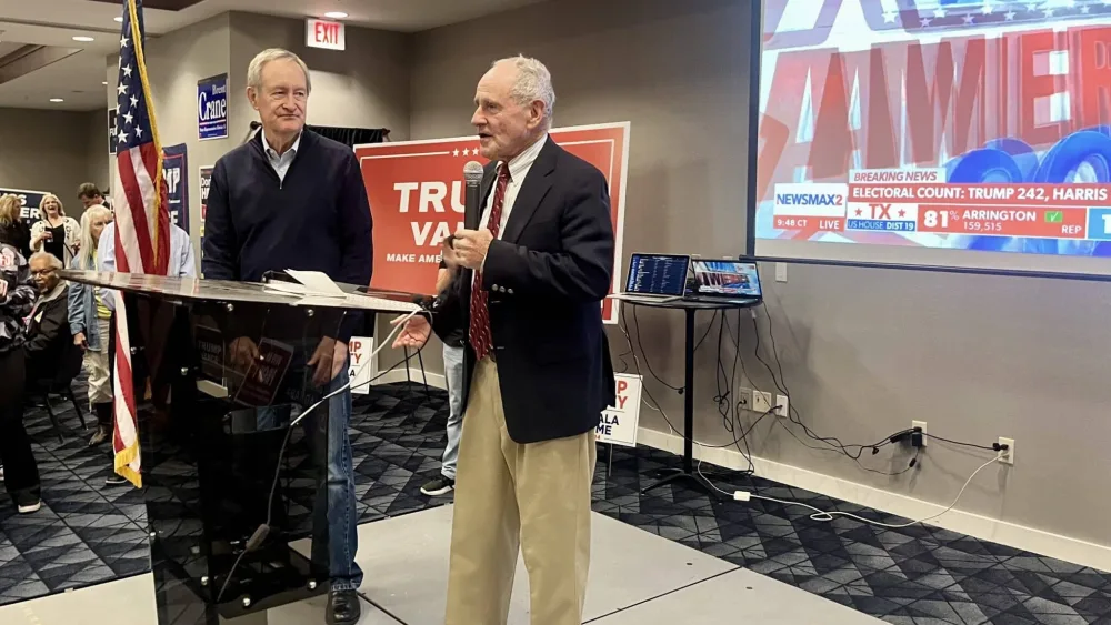 U.S. Sens Mike Crapo, left, and Jim Risch, both R-Idaho, speak at the Idaho Republican Party election night watch party in November 2024 in Meridian. (Clark Corbin/Idaho Capital Sun)