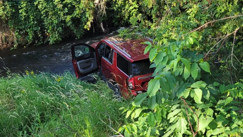 Crash into Creek