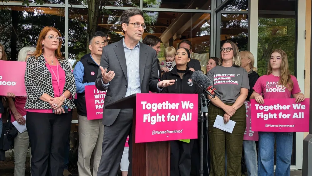 Governor Bob Ferguson joins other elected officials and community leaders at a press conference on how Medicaid cuts will affect Planned Parenthood.