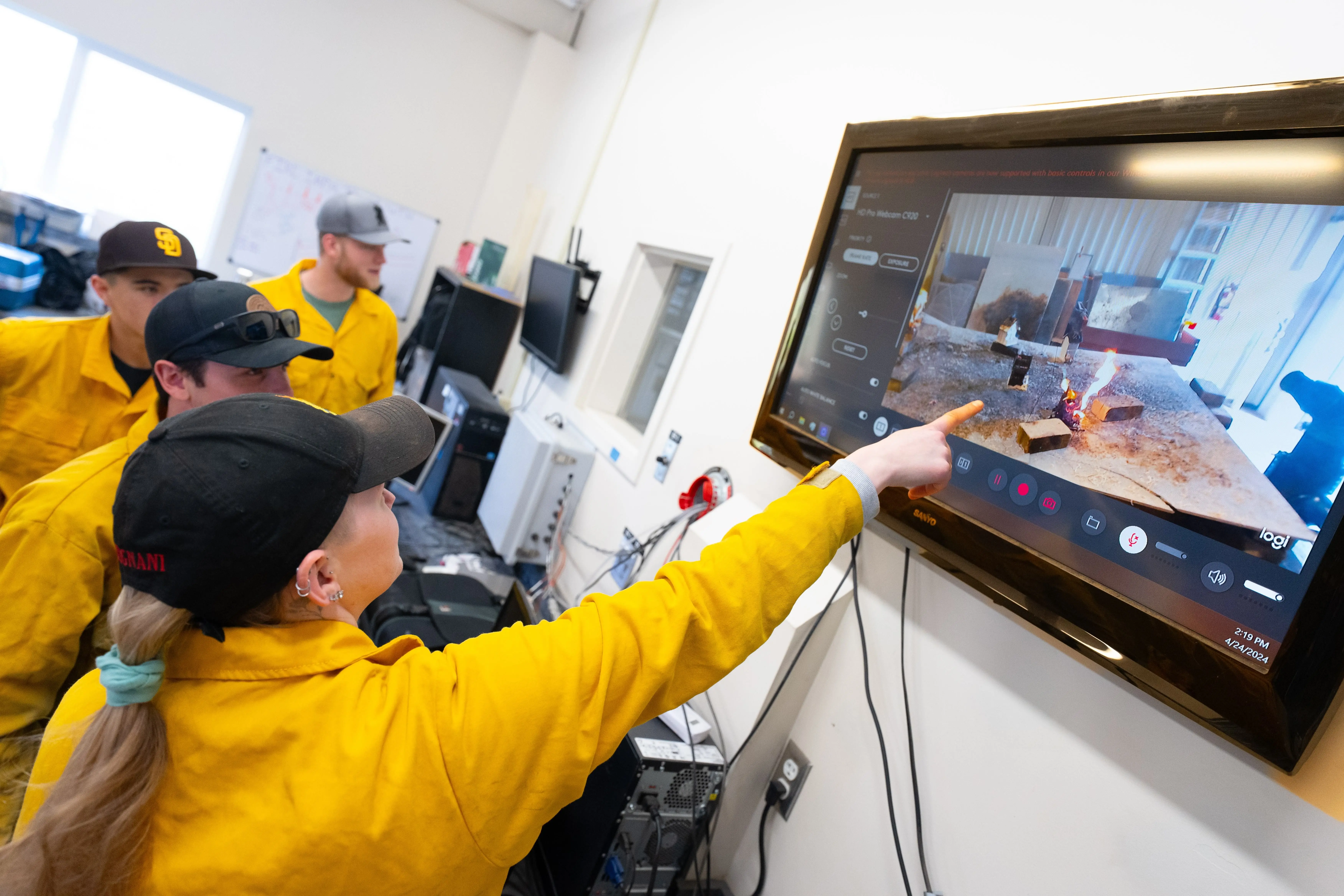 College of Natural Resources students work with the Ember Generator for Forest Fire Simulation. The Ember Generator is used to simulate wildfire conditions and allow for the study of ember propagated wildfires. - University of Idaho