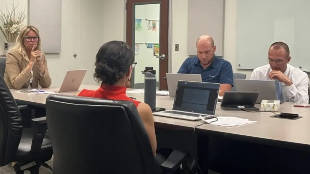 A panel of state officials, school architects and others consider applications to a cooperative loan fund for school facilities on Monday, Aug. 4 at the Idaho Department of Education’s office in Boise. (Ryan Suppe/EdNews)
