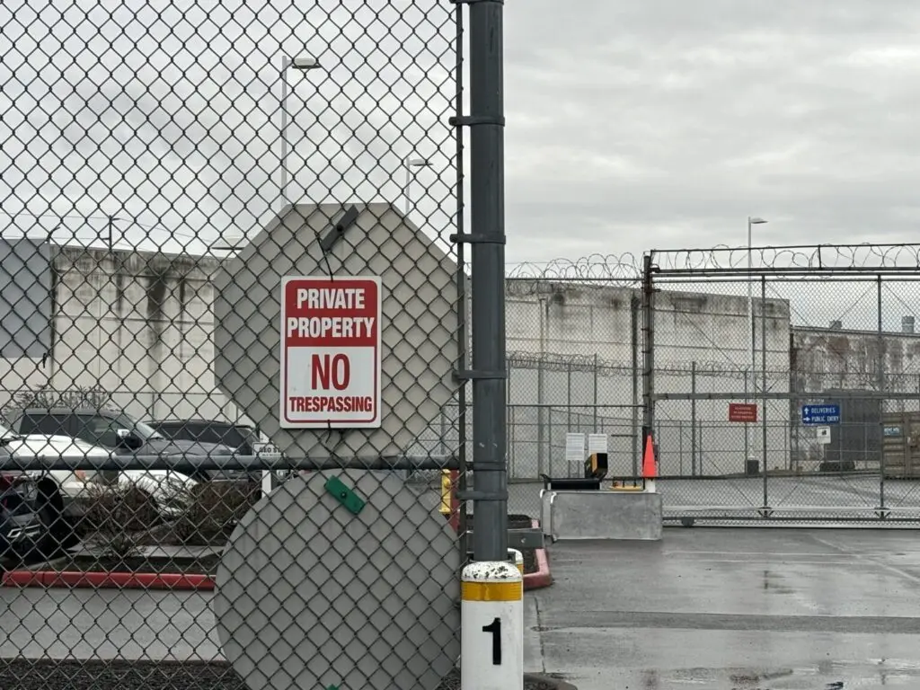 A “no trespassing” sign outside of Northwest ICE Processing Center, also known as Northwest Detention Center. (Photo by Grace Deng/Washington State Standard)