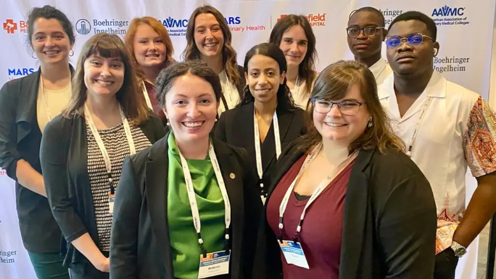 WSU students who attended and presented their research at the national Veterinary Scholars Symposium in Spokane pose for a photo inside the Spokane Convention Center, Friday, Aug. 8.