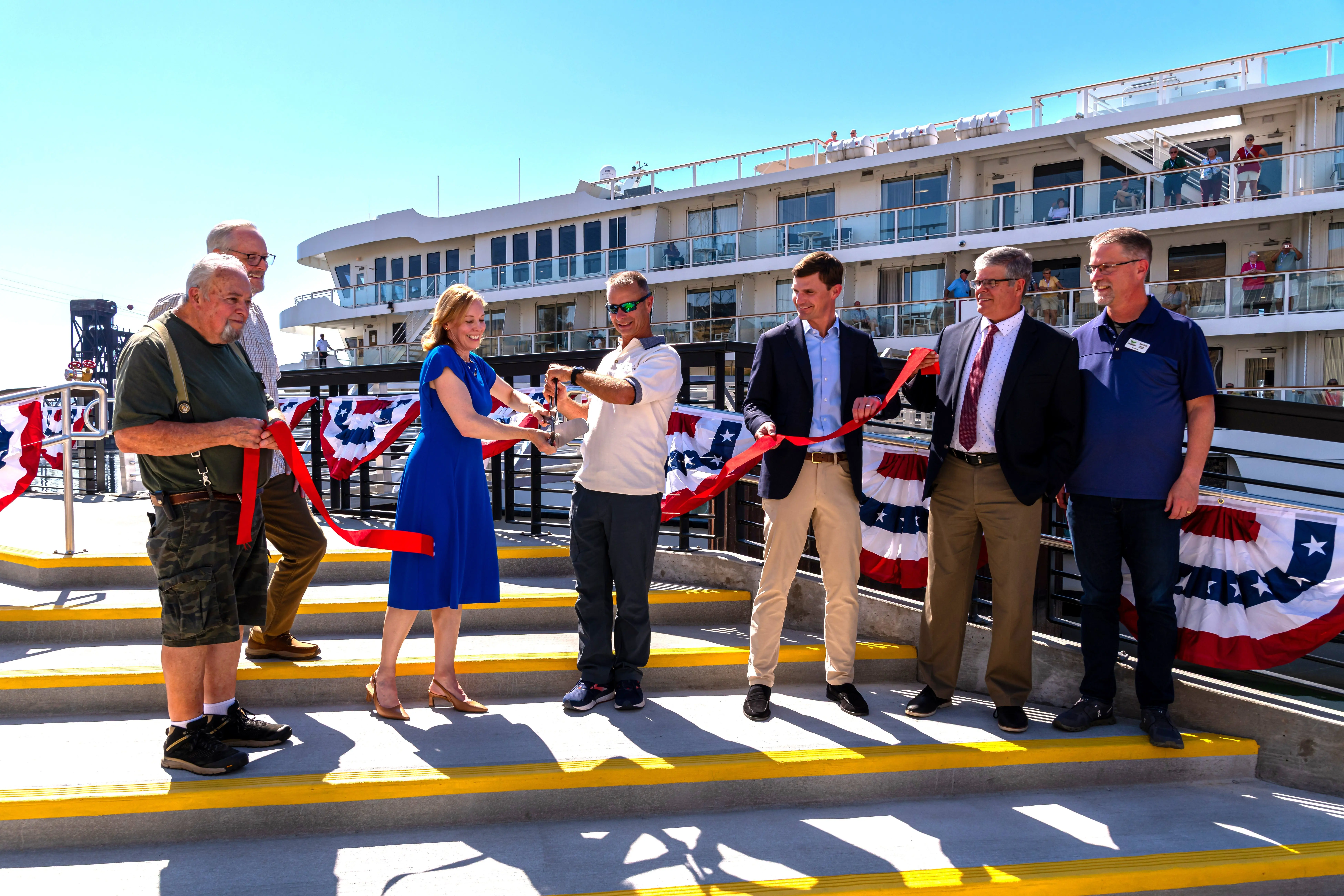 (L-R) Port Commissioner Jerry Klemm, Commissioner Mike Thomason, ACL President & CEO Charlie Robertson, Port General Manager Scott Corbitt and Chamber of Commerce Board Chairman Tobe Finch looked on as Kristin Meira, ACL Director of Government Relations and Port Commissioner Joe Anderson perform the ribbon cutting honors.