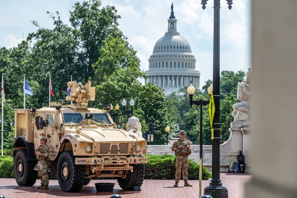 U.S. Soldiers with the District of Columbia National Guard stand watch in support of Joint Task Force–District of Columbia during the DC Safe and Beautiful mission in Washington, D.C., Aug. 16, 2025. Guard members are positioned at key locations throughout the city to provide a visible security presence alongside law enforcement partners. (U.S. Army photo by Sgt. Aaron Troutman)