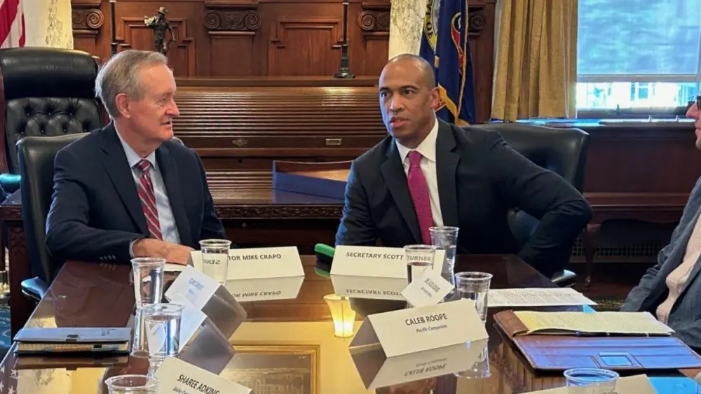 Sen. Mike Crapo, R-Idaho, and Housing and Urban Development Secretary Scott Turner speak on Aug. 19 at a roundtable housing discussion held in the Idaho Capitol in Boise. (Laura Guido / Idaho Capital Sun)