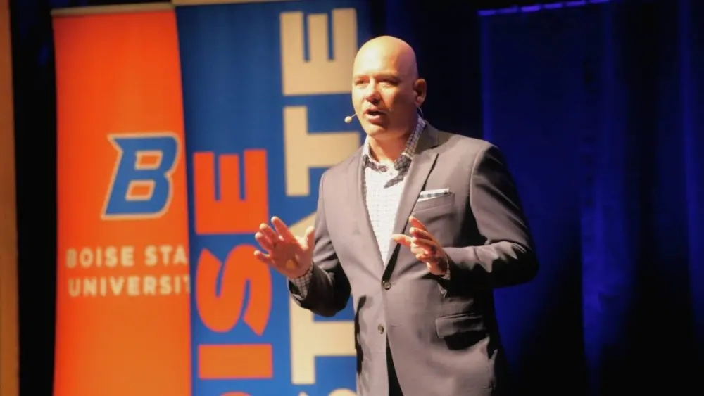 Jeremiah Shinn, Boise State University’s interim president, gives the State of the University address at the Morrison Center on Wednesday. (Kaeden Lincoln/IdahoEdNews)