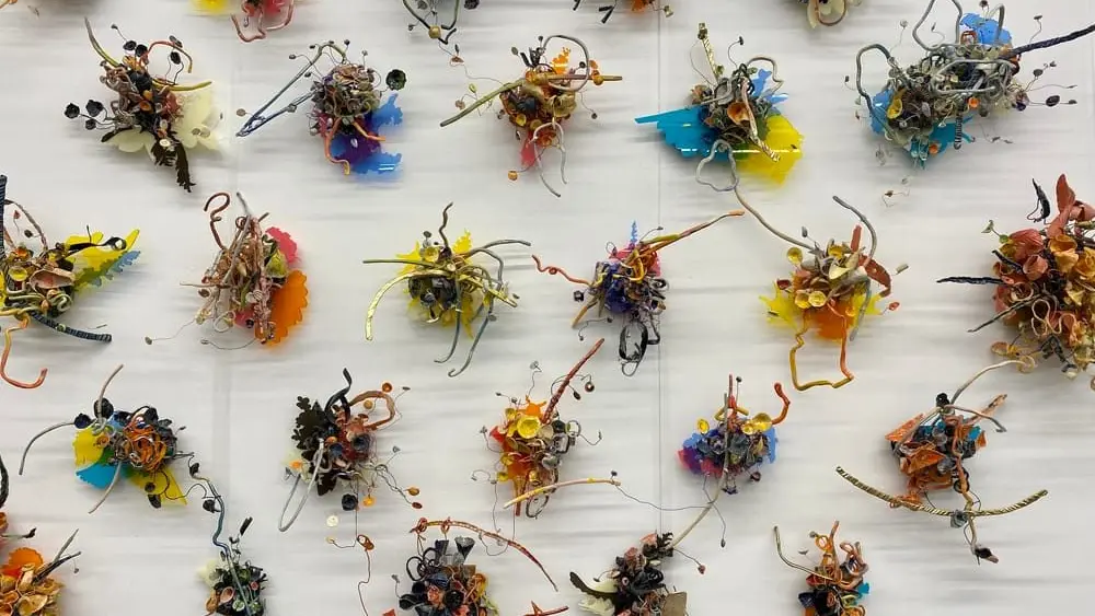 'Plush,’ artist Io Palmer’s tall ceramic wall installation at Bumbershoot 2024. (Brangien Davis/Cascade PBS)