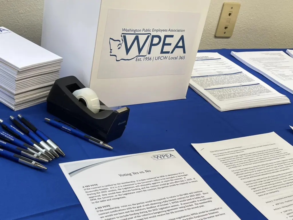 Members of Washington Public Employees Association did not receive a pay hike in July as other state workers did because their contract did not get funded in the budget. They are now voting on new agreements that would get them pay hikes. (Photo by Jerry Cornfield/Washington State Standard)
