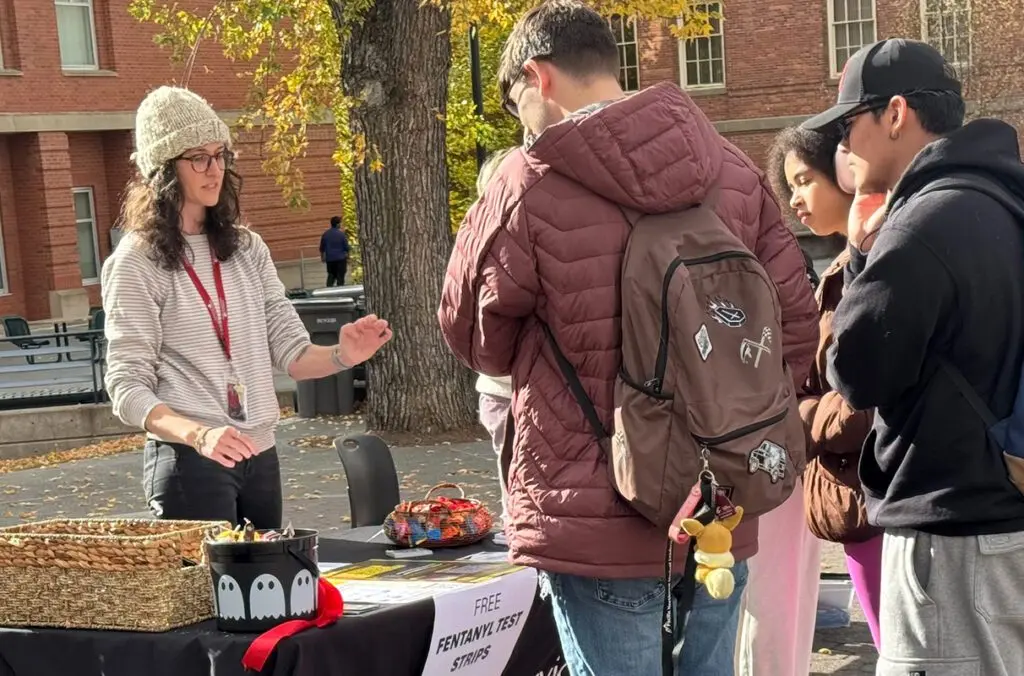 Tabling on the Terrell Mall is one of many ways Cougar Health Services educates students and the broader community about opioid overdose prevention. The low-pressure environment encourages students to ask questions and take free fentanyl test strips (photo by Student Affairs/WSU).