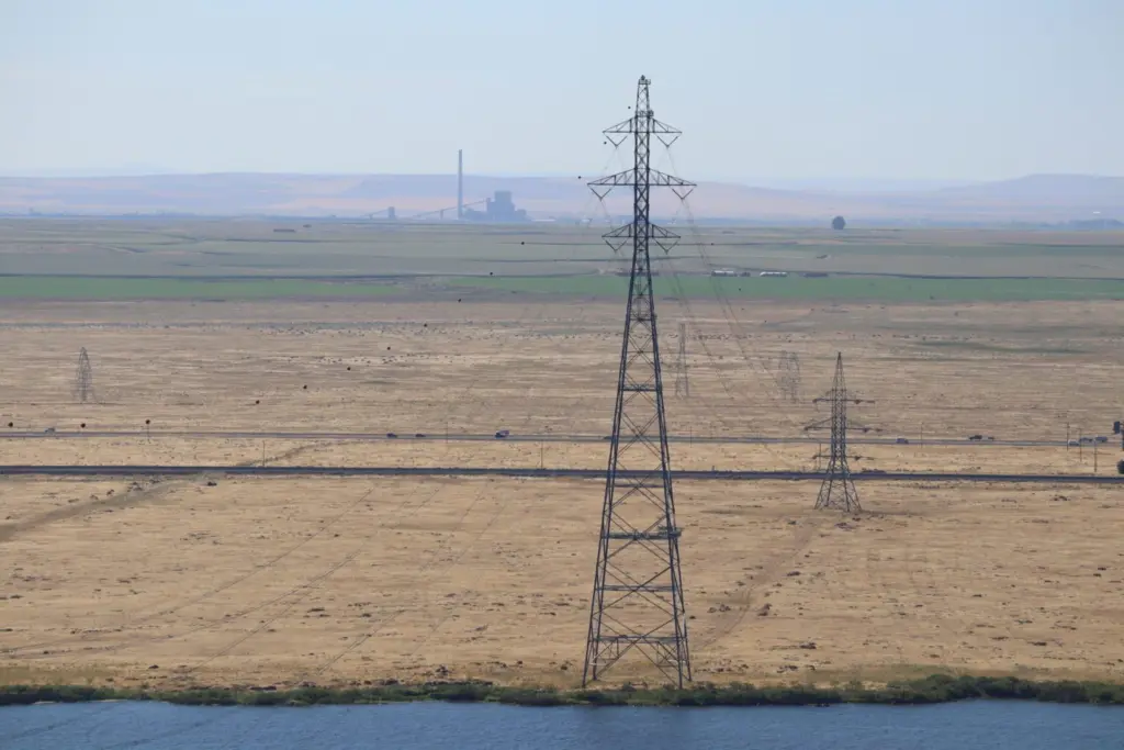 Portland General Electric’s Boardman energy complex in the distance, as seen from Crow Butte across the Columbia River in 2019. (Photo by Tom Banse)