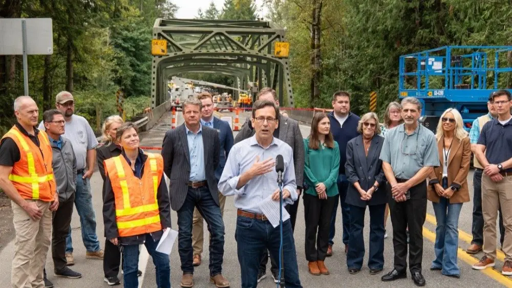 Governor Bob Ferguson visited the White River Bridge construction site, where crews are working daily to complete emergency repairs with the goal of reopening by mid-November. Photo courtesy of the Office of Governor Bob Ferguson