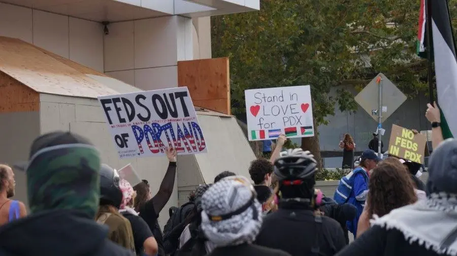 About 200 people showed up to protest outside the Immigration and Customs Enforcement building in Portland on Sunday, Sept. 28. (Photo by Alex Baumhardt/Oregon Capital Chronicle)