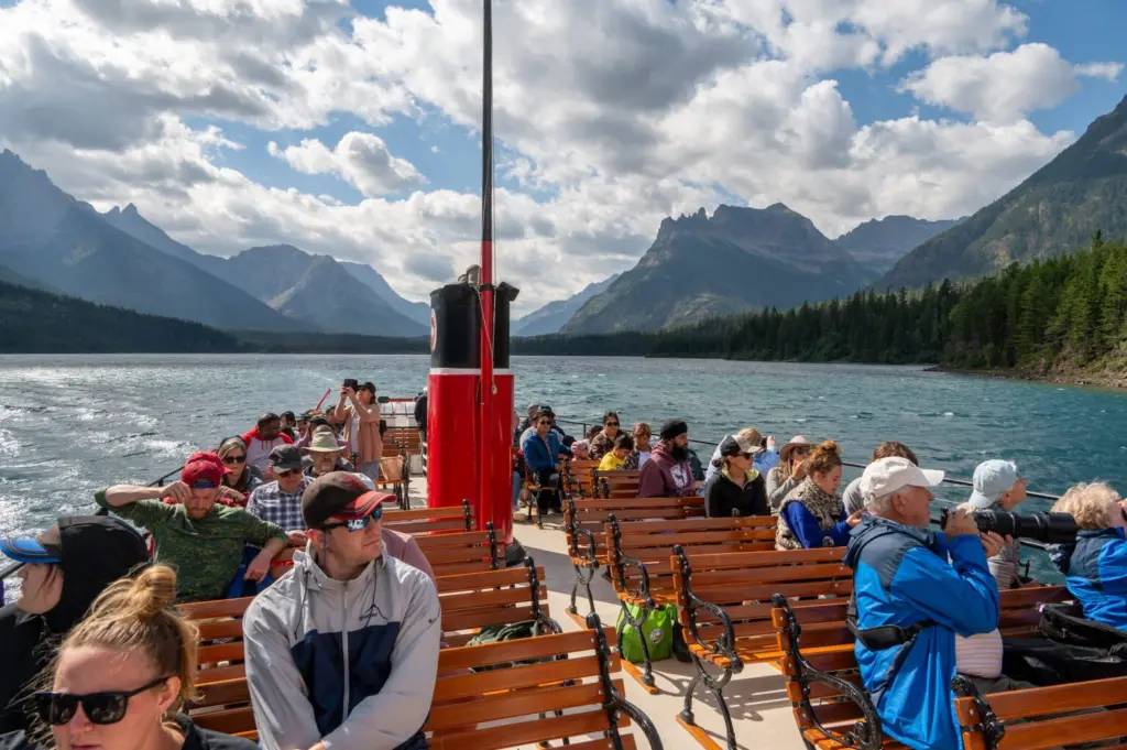 One of the boats that runs between Waterton Townsite and Goat Haunt is the International. Built in 1927, the International has carried thousands of visitors across the border during its lifetime. Passengers can disembark for a brief sightseeing opportunity, while others take the boat to start multi-day backpacking trips. (Photo by Glacier National Park / NPS)