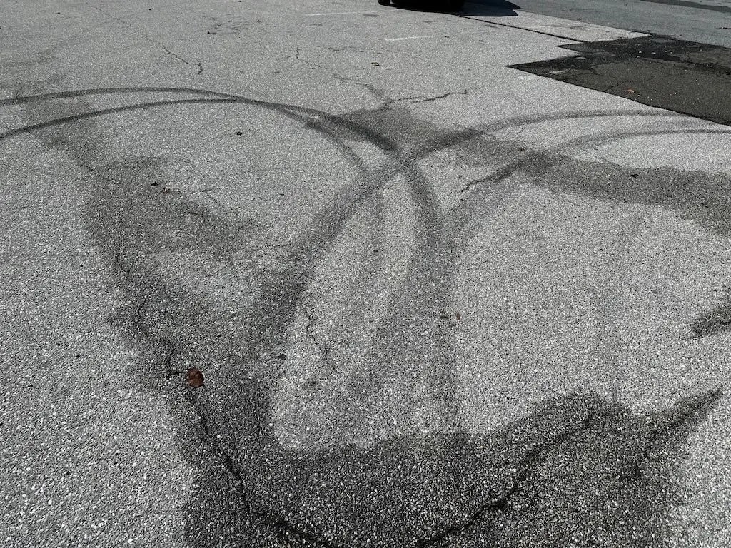 Tire marks remain from a car meetup in mid-September in Landover, Md. (Photo courtesy of the Prince George’s County Police Department)