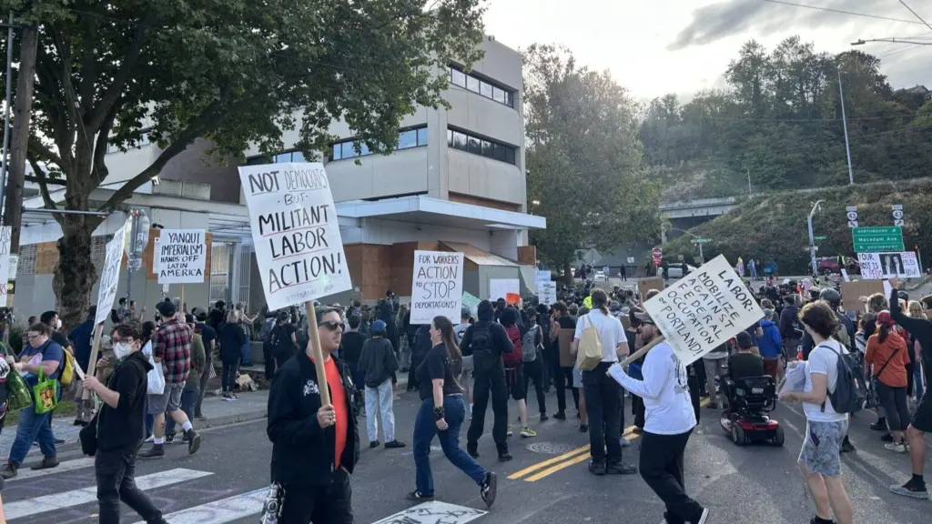 About 200 people showed up to protest outside the Immigration and Customs Enforcement building in Portland on Sunday, Sept. 28. (Photo by Alex Baumhardt/Oregon Capital Chronicle)