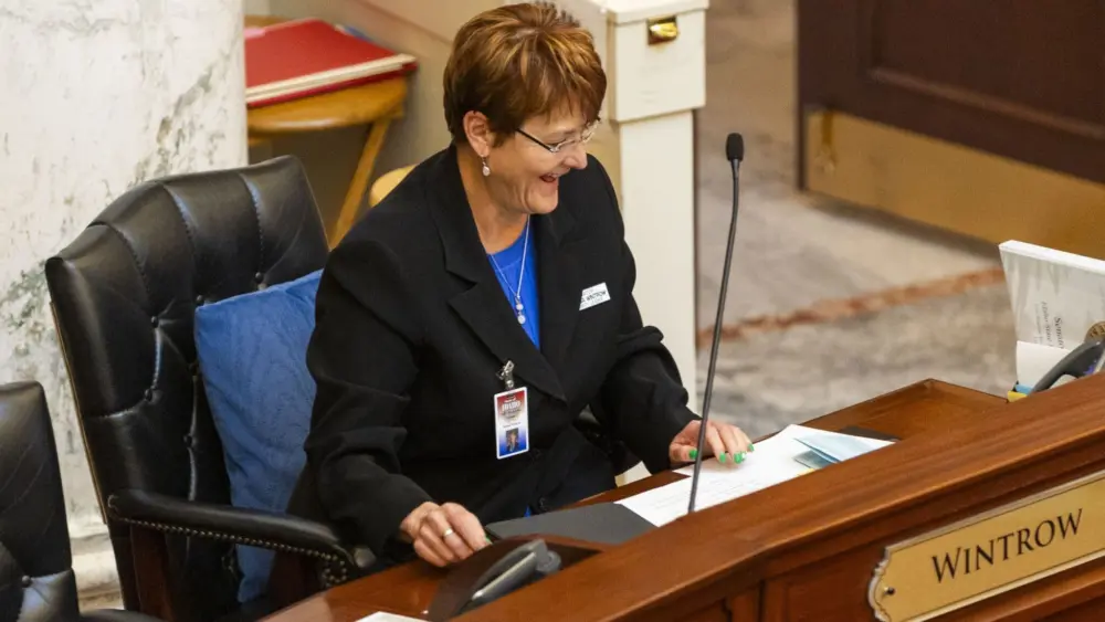 Senate Minority Leader Melissa Wintrow, D-Boise, works from the Senate floor on the morning of March 10, 2025, at the Idaho Capitol Building in Boise. (Pat Sutphin for the Idaho Capital Sun)
