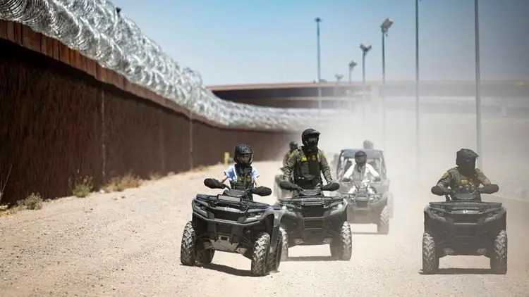Homeland Security Secretary Kristi Noem rides an ATV along the U.S.-Mexico border wall in El Paso, Texas, on April 28, 2025. Photo: Tia Dufour / U.S. Department of Homeland Security / Public Domain