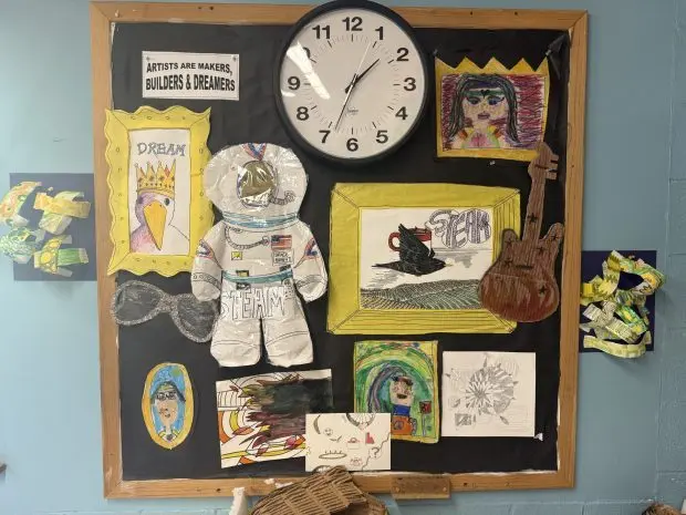 A bulletin board of students’ art in Karen Rohn’s classroom.