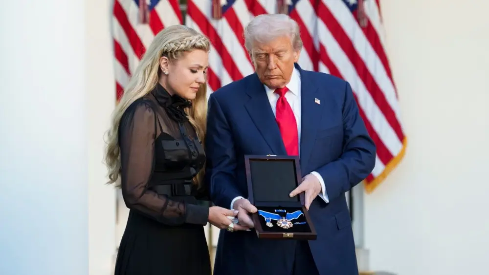 President Donald Trump posthumously awards the Medal of Freedom for Charlie Kirk to his widow Erika Kirk, Tuesday, October 14, 2025, during a ceremony in the Rose Garden of the White House. (Official White House Photo by Andrea Hanks)