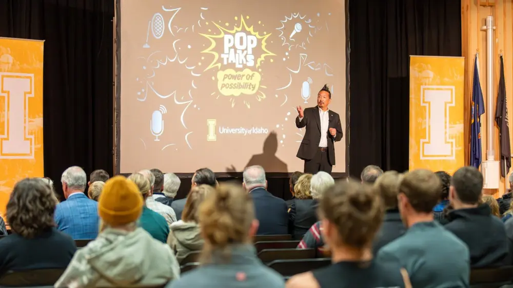 Christopher Nomura, vice president for research and economic development, emcees the 2024 POP Talks.