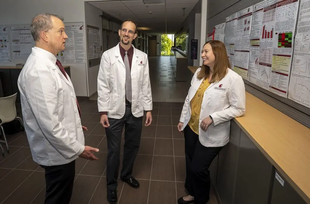 Professor Brian Gates (left), Assistant Professor Jeffrey Clark (center) and Professor Kimberly McKeirnan (right), all of the WSU Department of Pharmacy and Pharmaceutical Sciences, co-authored a new paper reporting the results of a Spokane project aimed at reducing discrepancies in the medication lists of home health-care patients. Their project introduced a new tool for ensuring medication lists are in order and reduced hospitalizations among patients significantly (photo by Cori Kogan, WSU Spokane).
