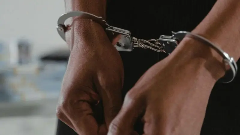 handcuffs - Photo by Tima Miroshnichenko: https://www.pexels.com/photo/persons-hands-in-handcuffs-6266772/