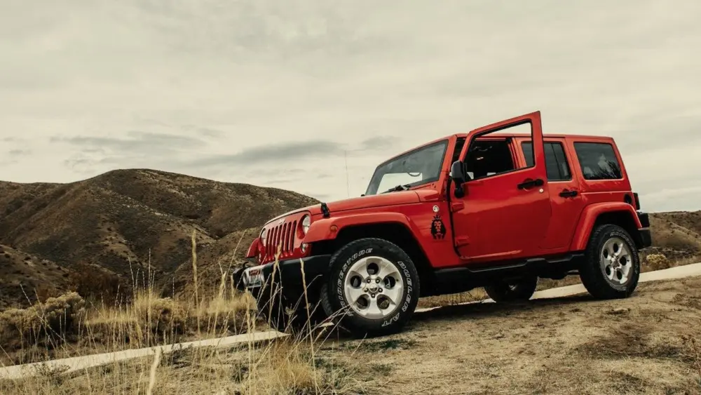 Photo by Brett Sayles: https://www.pexels.com/photo/photo-of-red-suv-on-dirt-road-1592261/