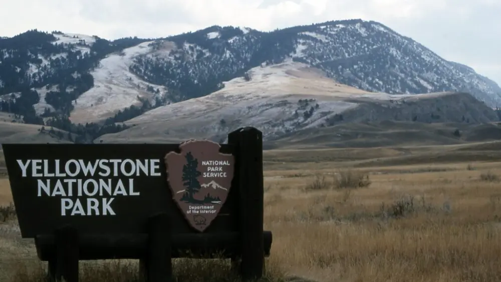 Yellowstone National Park sign at the North Entrance (Photo by Jim Peaco | Yellowstone National Park).