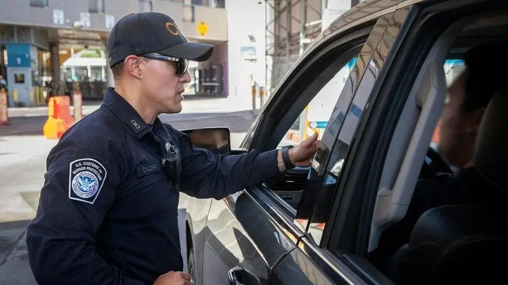 A U.S. Customs and Border Protection officer inspects a vehicle at the Port of DeConcini in Nogales, Ariz., on June 11, 2024. Photo: Jerry Glaser / U.S. Customs and Border Protection via Flickr / United States Government Work
