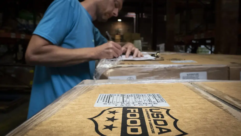 FeedMore workers receive pallets of U.S. Department of Agriculture ham. FeedMore is one of USDA’s partner agencies, located in Richmond, Virginia, providing food assistance as part of the Commodity Supplemental Food Program and The Emergency Food Assistance Program. (Photo by Preston Keres/USDA)