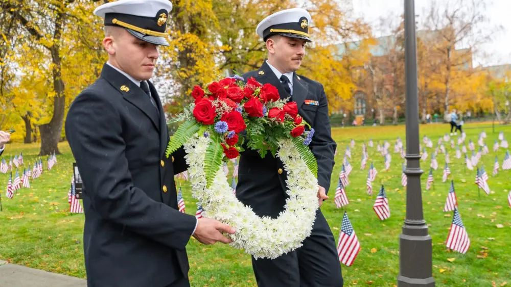Photo Credit: University of Idaho Caption: People take part in the 2024 Veterans Day wreath-laying ceremony at the University of Idaho.