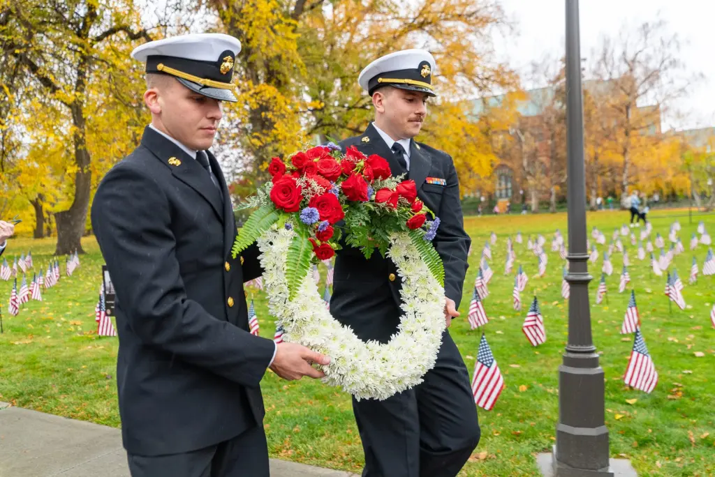 Photo Credit: University of Idaho Caption: People take part in the 2024 Veterans Day wreath-laying ceremony at the University of Idaho.