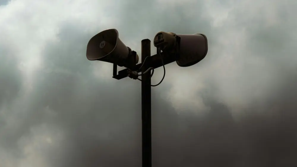 Photo by Nur Andi Ravsanjani Gusma: https://www.pexels.com/photo/clouds-over-loudspeakers-on-post-11464701/