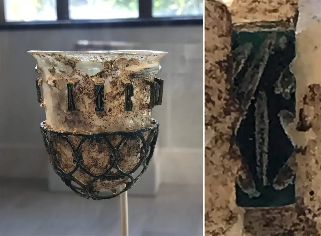 Roman glass openwork vessel with a detail of its symbol on the right. Inscription: BIBE V[I]VAS I[..]A (Drink may you live I[..]a!) (photos courtesy of Corning Museum of Glass).