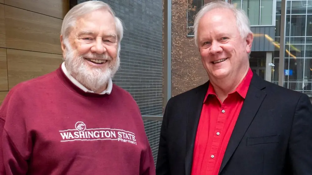 Former deans at WSU’s College of Pharmacy and Pharmaceutical Sciences: Bill Fassett, left, and Mark Leid.