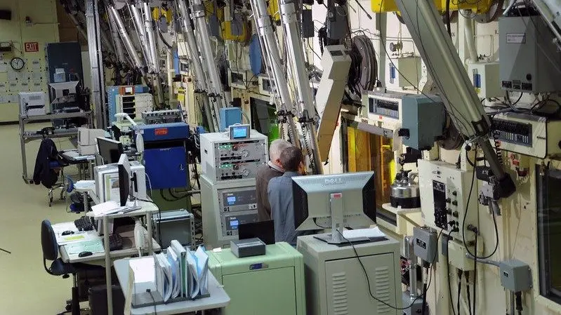 Researchers work in the Idaho National Laboratory’s Hot Fuel Examination Facility. (Photo courtesy of the Idaho National Laboratory)